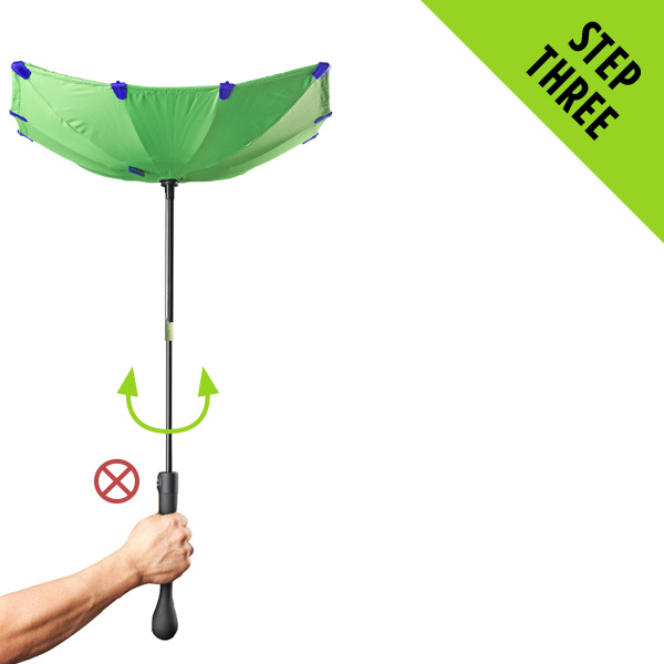Take your thumb off the button. Gently twist the handle from side to side to push the canopy into the corners of the flue.